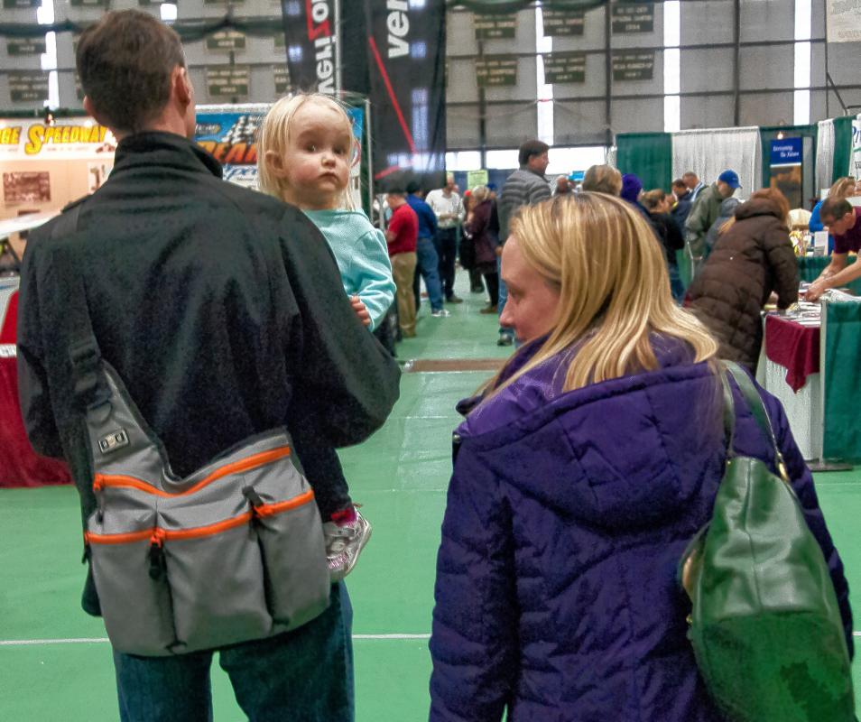 Gretchen Werner, 18 months, is all eyes at the HomeLife Expo. She is with her parents, Bill and Alicia Werner, of South Royalton. Medora Hebert photograph -