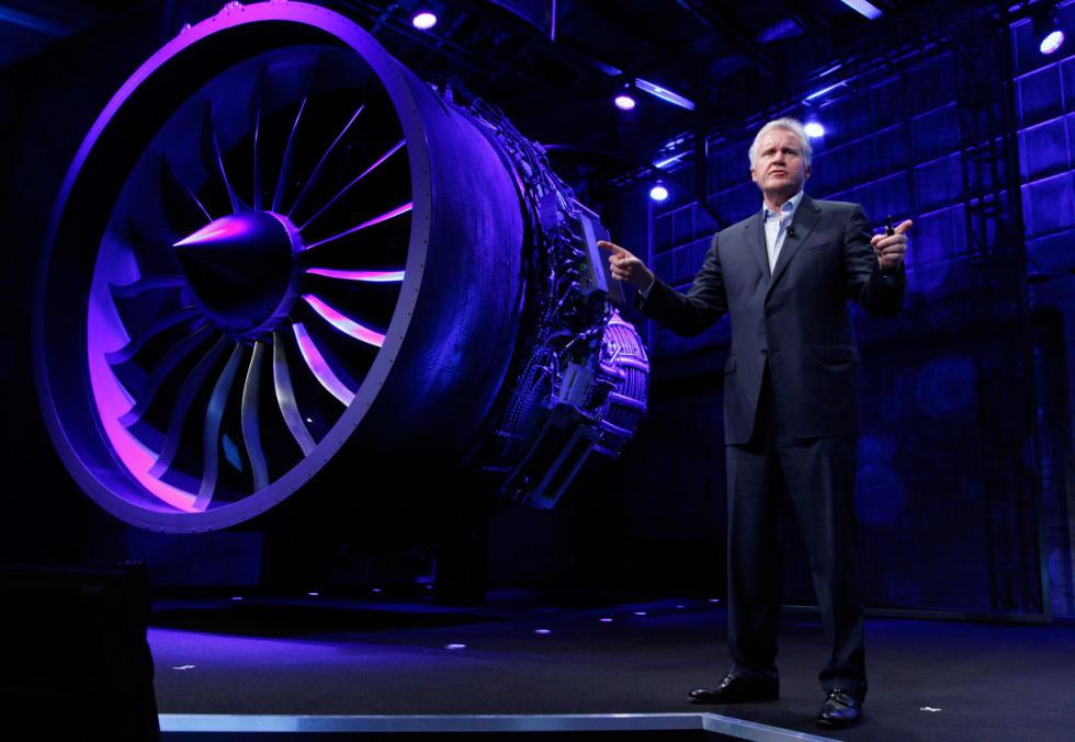 FILE - In this Nov. 29, 2012 file photo provided by General Electric, GE CEO and Chairman Jeff Immelt, stands in front of a jet engine during the Mind + Machines 2012 event in San Francisco. The sale of the company's appliance division, announced Monday, Sept. 8, 2014, is the latest in a long string of moves by GE to shift its focus away from consumers and toward the manufacturing of giant, complex industrial machines such as aircraft engines, locomotives, gas-fired turbines and medical imaging equipment. (AP Photo/General Electric, File) - Uncredited | General Electric