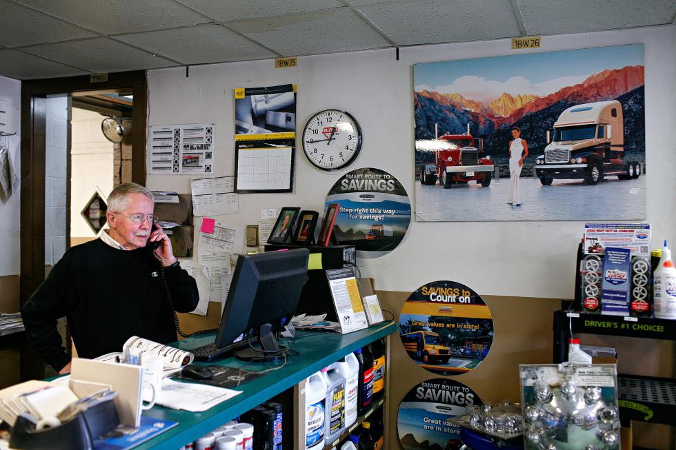Daryl Osgood talks with a customer about parts availability at the Freightliner dealership in Lebanon, N.H., on April 3, 2015. Osgood has worked at the truck dealer's parts department for 17 years and worked at Freightliner's predecessor, Decato Brothers, for 15 years. (Valley News - Geoff Hansen) <p><i>Copyright Â© Valley News. May not be reprinted or used online without permission. Send requests to permission@vnews.com.</i></p> - Geoff Hansen | Valley News