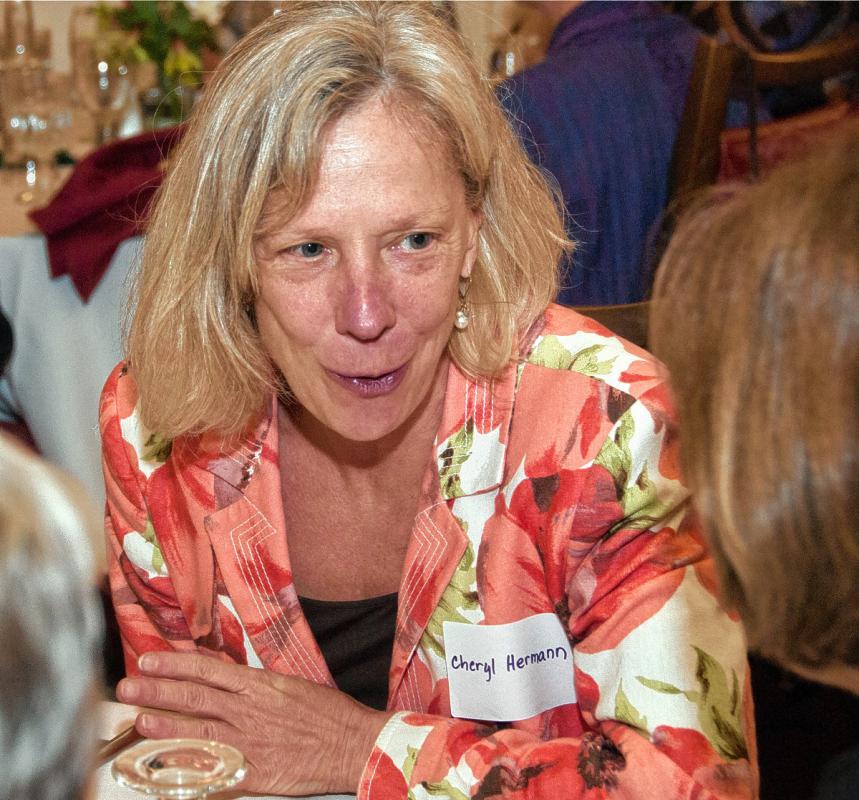 Cheryl Hermann talks with a friend during the annual dinner of the Women’s Network of the Upper Valley, held at the Hotel Coolidge in White River Junction on May 19.  Medora Hebert photograph -