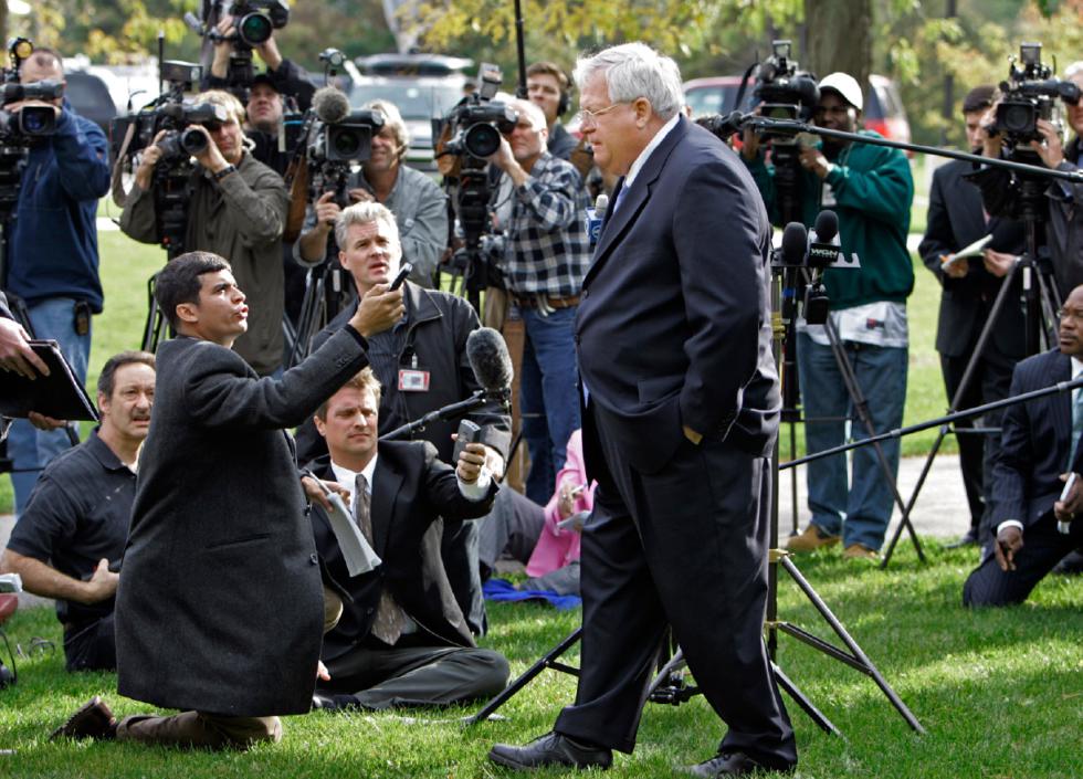 FILE - In this Oct. 10, 2006 file photo, House Speaker Dennis Hastert walks away from the media after answering questions in Aurora, Ill.  Hastert said he'll dismiss anyone on his staff found to have covered up concerns about ex-Rep. Mark Foley's approaches to former pages. A newly unveiled indictment against Hastert released Thursday, May 28, 2015,  accuses the Republican of agreeing to pay $3.5 million in hush money to keep a person from the town where he was a longtime schoolteacher silent about "prior misconduct."   (AP Photo/M. Spencer Green, File) - M. Spencer Green | AP