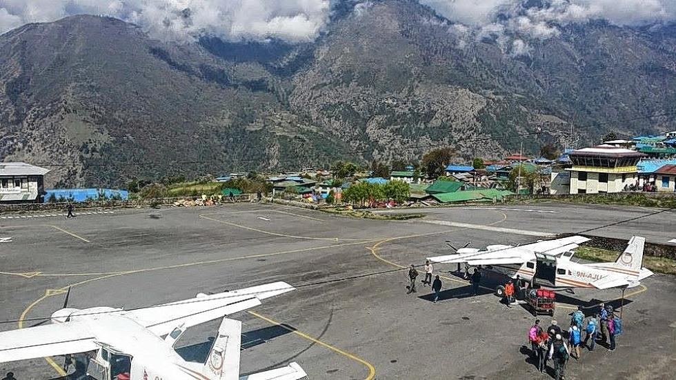 Global Rescue clients prepare to leave Lukla for Kathmandu Thursday on a plane chartered by the company. Global Rescue photograph - 
