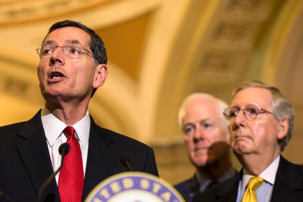 FILE - In this May 5, 2015 file photo, Sen. John Barrasso, R-Wyo., left, accompanied by Senate Majority Whip John Cornyn of Texas, center, and Senate Majority Leader Mitch McConnell of Ky. speaks during a news conference  on Capitol Hill in Washington. Senate Republicans discussed a proposal Wednesday to temporarily help millions of people who could lose federal health care subsidies should the Supreme Court annul the aid, which has been a pillar of President Barack Obamas health care law.  (AP Photo/Brett Carlsen) - Brett Carlsen | FR170822 AP