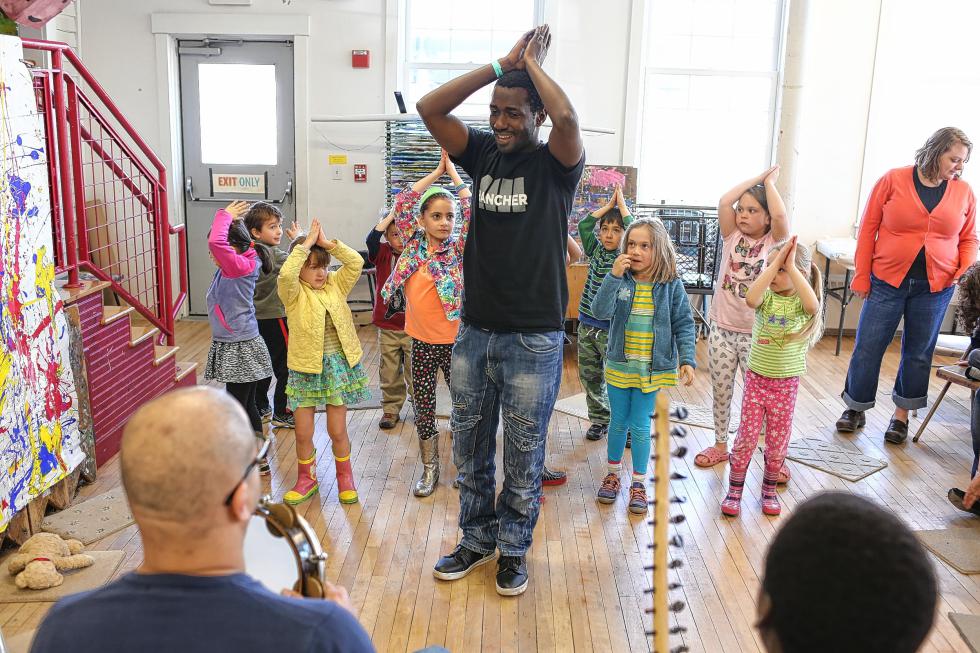 During their visit to spring vacation camp at the AVA Gallery, 5- to 7-year-olds enjoyed learning dances from  Nile Project artist Steven Sogo. Rob Strong photograph.   Copyright 2015 - Rob Strong | Rob Strong