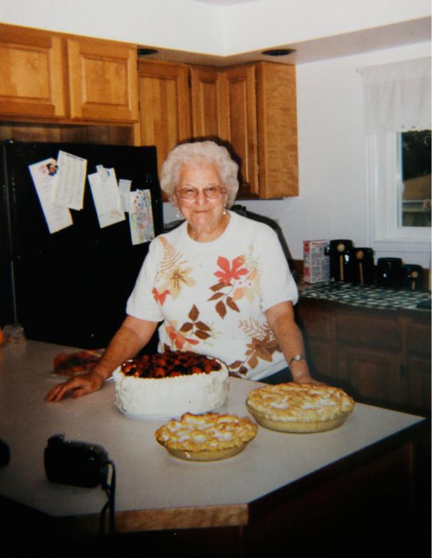This undated family photo provided by Roslyn Duffy shows her late mother, Evelyn Nappa, with homemade cakes and pies. Duffy had to scramble to find a home willing to take Medicaid payments after her mother was evicted from a Seattle assisted-living facility. The stress and the change of surroundings strained her mother's health, Duffy said, and six weeks after moving, she was dead. (Roslyn Duffy via AP) - Uncredited | Roslyn Duffy