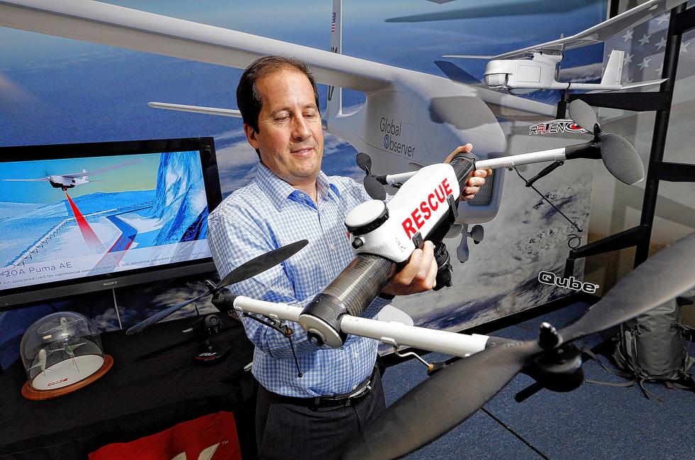 Steven Gitlin, Vice President Marketing Strategy and Communications at AeroVironment in Simi Valley, Calif., poses for a portrait on May 13, 2015 as he holds the Qube Drone, the rugged and reliable small unmanned aircraft system (UAS) specifically targeting the needs of first responders. The Qube packaged system fits easily in the trunk of a car, and can be assembled and ready for flight in less than five minutes to provide a rapidly deployable eye in the sky, transmitting live video directly to the operator. (Al Seib/Los Angeles Times/TNS) - Al Seib | Los Angeles Times