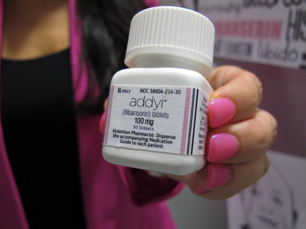Sprout Pharmaceuticals CEO Cindy Whitehead holds a bottle for the female sex-drive drug Addyi at her Raleigh, N.C., office on Tuesday, Aug. 15, 2015. After two rejections, the U.S. Food and Drug Administration gave approval Tuesday for the drug, also known as flibanserin, as a treatment for hypoactive sexual desire disorder, a first for women. (AP Photo/Allen G. Breed) - Allen G. Breed | AP