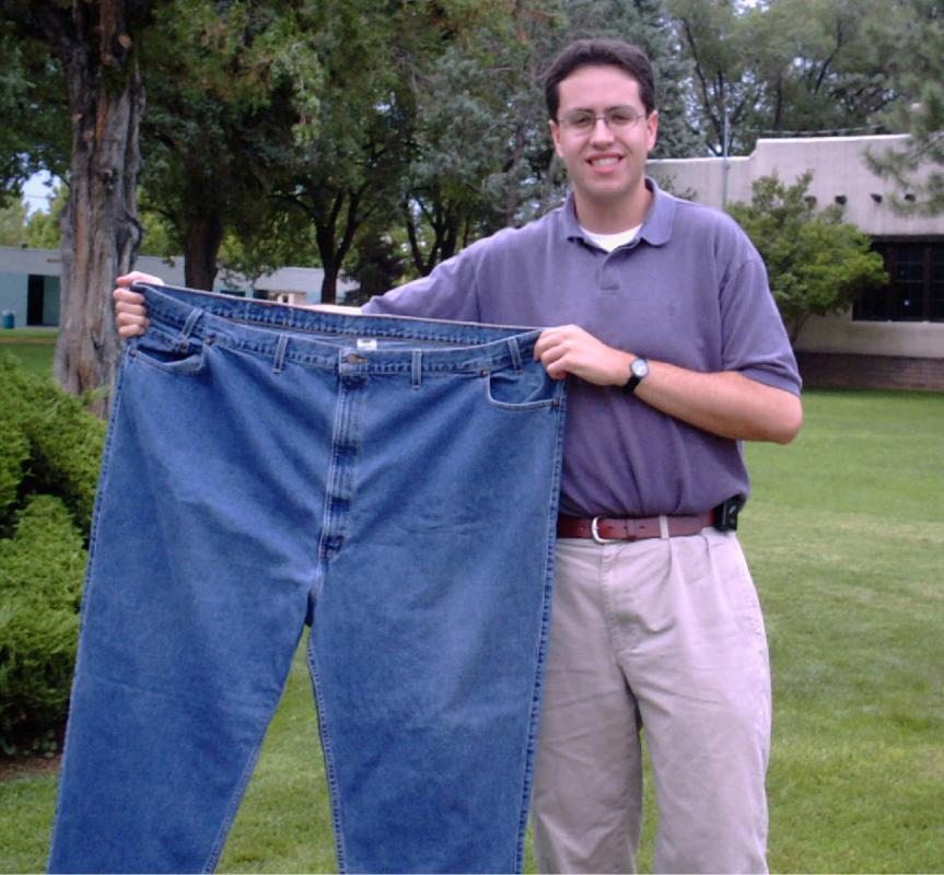 FILE - In this Aug. 7, 2001 file photo, Jared Fogle holds up a pair of jeans he used to wear after losing weight in Albuquerque, N.M.   Subway benefited hugely from  Fogles weight loss story. Now the sandwich chain needs to figure out how to prevent him from overshadowing its future. (AP Photo/Ivan Chavez) - IVAN CHAVEZ | AP