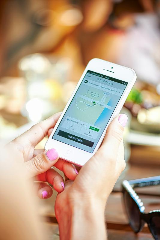 A growing number of families are relying on ride-hailing services like Uber to get kids to and from school adn activities. (Photo courtesy Uber/TNS) - Handout | Uber
