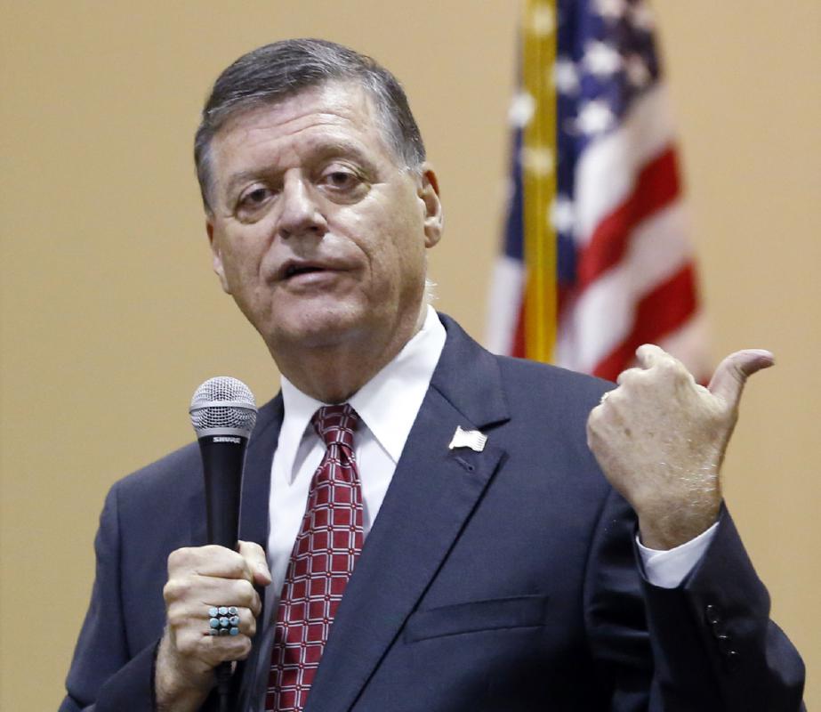 FILE - In this Aug. 18, 2015, photo, Rep. Tom Cole, R-Okla., gestures as he speaks during a town hall meeting in Moore, Okla. Congress returns on Sept. 8 with a critical need for a characteristic that has been rare through a contentious spring and summer _ cooperation between Republicans and President Barack Obama. "Its going to take a sense of give and take on both sides," said Cole. ":The big deal will be, Can you come to a deal on transportation, debt ceiling and avoiding sequester? So a large budget deal will determine, I think, whether or not weve really been successful." (AP Photo/Sue Ogrocki, File) - Sue Ogrocki | AP