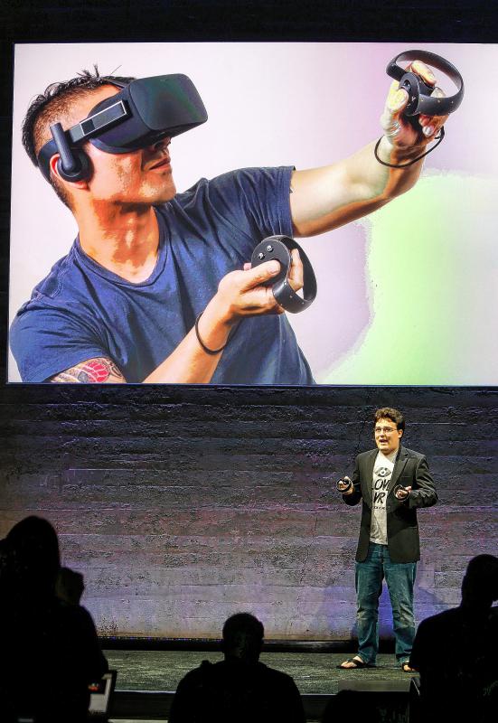 Oculus founder Palmer Luckey introduces Touch controllers for the Rift virtual reality headset during a media event at Oculus in San Francisco, Calif., on Thursday, June 11, 2015. (Karl Mondon/Bay Area News Group/TNS) - Karl Mondon | Contra Costa Times