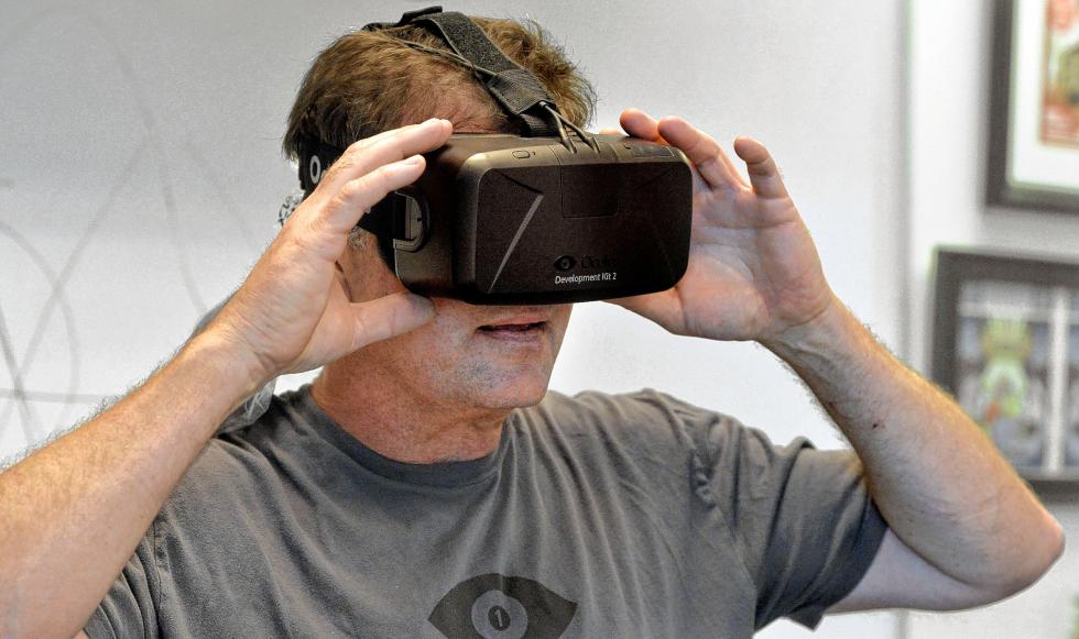 Jack McCauley, one of the founders of Oculus VR, has his photo taken wearing one of their virtual reality units on June 3, 2015, in Livermore, Calif. (Doug Duran/Bay Area News Group/TNS) - Doug Duran | Contra Costa Times