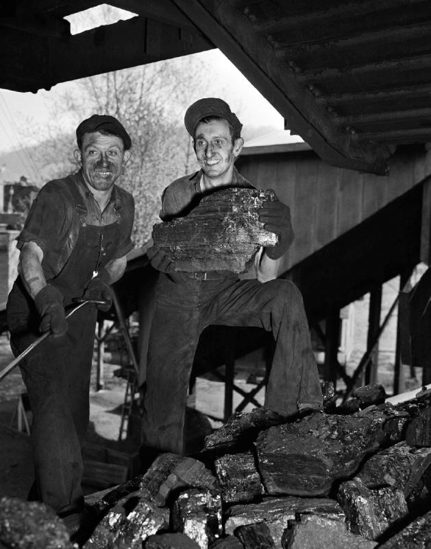 FILE - In this May 4, 1943 photo, workers at the Clover Fork mine at Harlan, Ky., return to work grading coal following a government-mine workers truce after several days of a work stoppage. The union era's death knell sounded in Kentucky on Dec. 31, 2014, when Patriot Coal announced the closing of its Highland Mine. (AP Photo/File) - AP