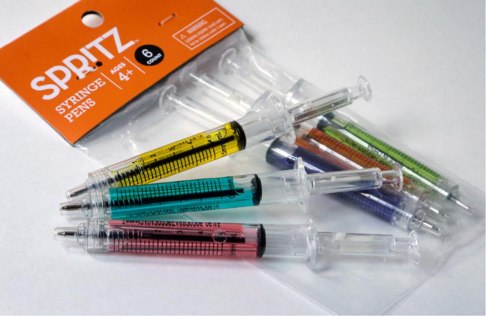In this Wednesday, Oct. 14, 2015, photo, pens that look like syringes are displayed with their packaging in Boston. The pens are being sold as Halloween novelty toys at Target stores and some online retailers. (AP Photo/Steven Senne) - Steven Senne | AP