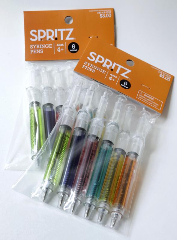 In this Wednesday, Oct. 14, 2015 photo pens that look like syringes are displayed in their packaging in Boston. The pens are being sold as Halloween novelty toys at Target stores and some online retailers. (AP Photo/Steven Senne) - Steven Senne | AP