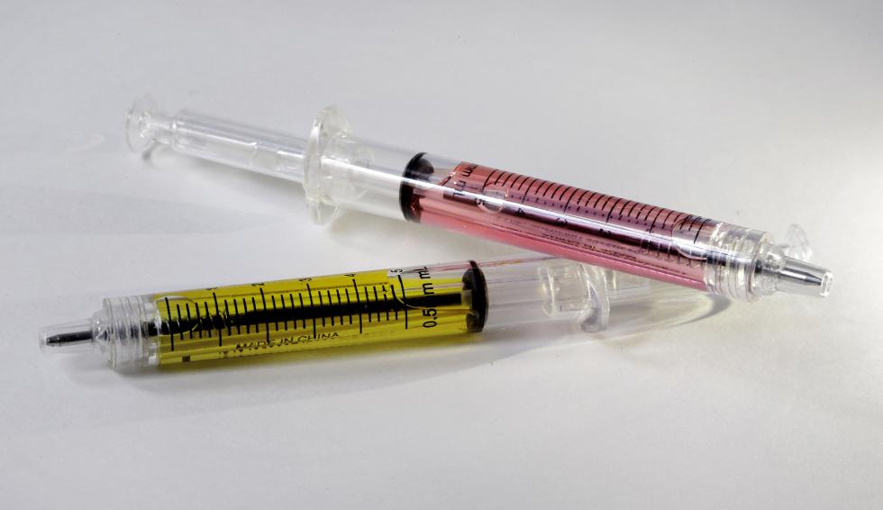 In this Wednesday, Oct. 14, 2015 photo pens that look like syringes are displayed in Boston. The pens are being sold as Halloween novelty toys at Target stores and some online retailers. (AP Photo/Steven Senne) - Steven Senne | AP