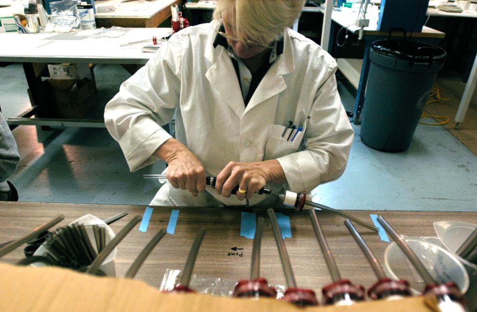 Susan Hines, a technician at Seldon Laboratories in Windsor, Vt., assembles a water filter on October 6, 2004. (Valley News - Jennifer Hauck)Copyright Â© Valley News. May not be reprinted or used online without permission. Send requests to permission@vnews.com. - Jennifer Hauck | Valley News