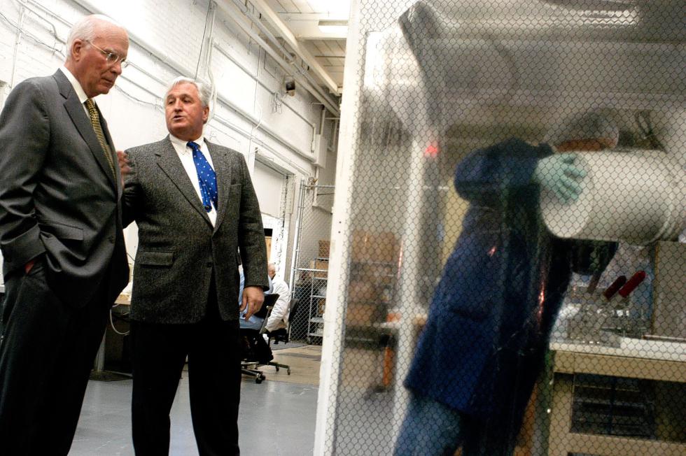 Sen. Patrick Leahy, left, and Seldon Laboratories CEO Alan Cummings, center, pause during a tour of the Seldon plant in Windsor, Vt., on March 22, 2006. (Valley News - James M. Patterson)<p><i>Copyright Â© Valley News. May not be reprinted or used online without permission. Send requests to permission@vnews.com.</i></p> - James M. Patterson | Valley News
