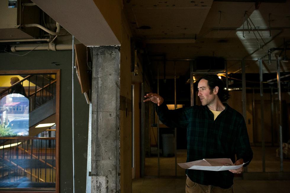 Holding a floor plan for the restaurant, Benjy Adler, co-owner of the Skinny Pancake, shows the space that will house the new restaurant inside of Hanover Park in Hanover, N.H., on Tuesday, November 10, 2015. Following renovations, owners Benjy and Jonny Adler expect to have the fast-casual style restaurant open in Spring 2016. (Valley News - Kristen Zeis) Copyright Â© Valley News. May not be reprinted or used online without permission. Send requests to permission@vnews.com. - Kristen Zeis | Valley News
