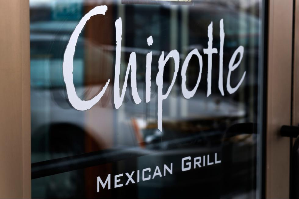 FILE - This Tuesday, Jan. 28, 2014, file photo, shows the door at a Chipotle Mexican Grill in Robinson Township, Pa. Chipotles stock dropped in premarket trading Tuesday, Dec. 8, 2015, as the Mexican food chain continues to deal with fallout from an E. coli outbreak and contends with weakening sales. (AP Photo/Gene J. Puskar, File) - Gene J. Puskar | AP