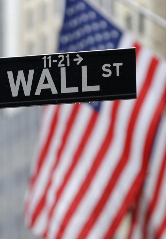 FILE - In this July 9, 2015 file photo, a Wall Street sign is seen near the New York Stock Exchange in New York. U.S. stocks moved lower on the last day of the year as the market headed for a sluggish end to 2015. (AP Photo/Seth Wenig, File) - Seth Wenig | AP