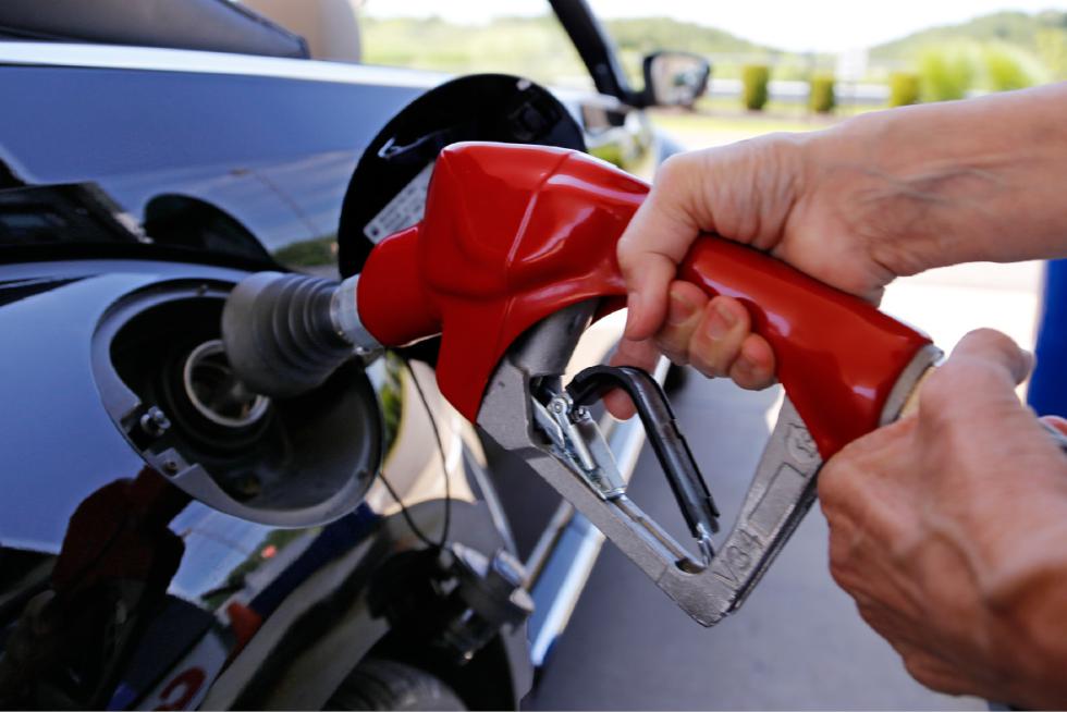 FILE - In this Thursday, July 16, 2015, file photo, a customer re-fuels her car at a Costco in Robinson Township, Pa. The plunging price of oil in 2016 is dragging stock markets to their worst start to a year ever, even though low fuel prices are great for consumers and most companies. (AP Photo/Gene J. Puskar, File) - Gene J. Puskar | AP