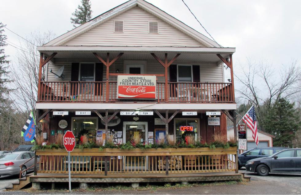 This Dec. 18, 2015 photo shows the Underhill Country Store in Underhill, Vt. The community rallied to keep the 130-year-old store open with plans to turn it into a cooperatively owned business after the owners, who are retiring, had been unable to sell it. Residents said the store is vital to the community. (AP Photo/Lisa Rathke) - Lisa Rathke | AP