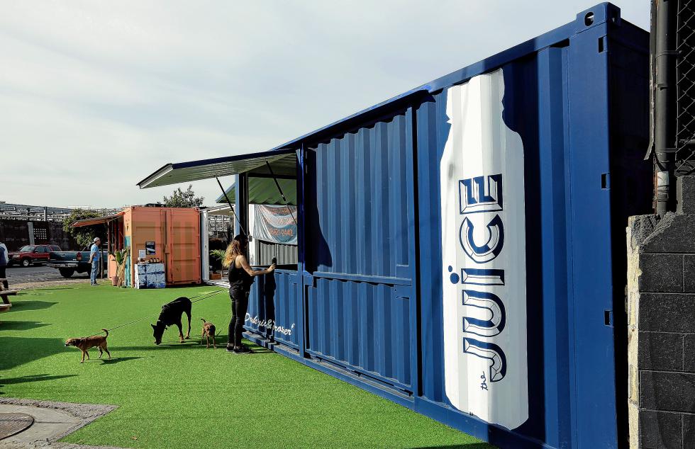 The Juice, a fresh juice and smoothie shop, has been operating out of a cargo container in the Arts District in downtown Los Angeles for four months, on January 22, 2016. The businessâ owners were won over by the coolness factor. (Mel Melcon/Los Angeles Times/TNS) - Mel Melcon | Los Angeles Times