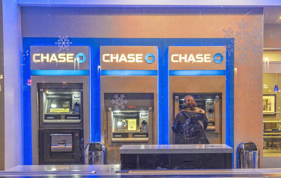 The addition of cardless ATMs comes as banks are trying to push customers to do more transactions online, on their phones or through ATMs. Above, at a branch last year in New York. (Richard B. Levine/Newscom/Zuma Press/TNS) - Richard B. Levine/Newscom | Zuma Press