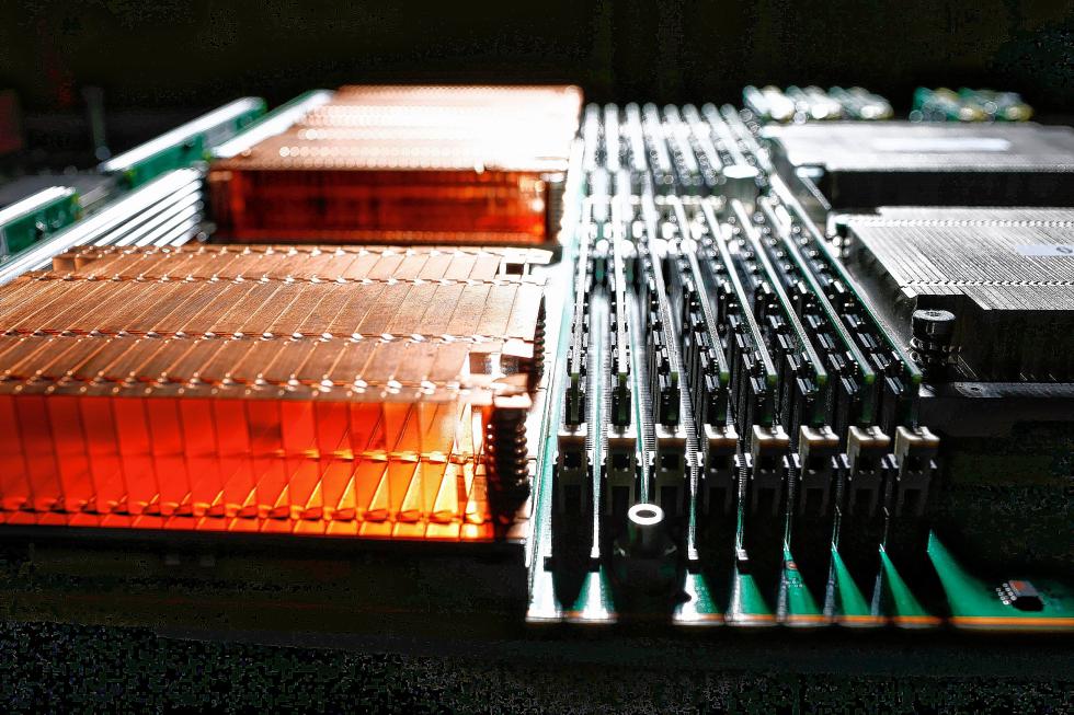 A detail of a computer blade in a Cray supercomputer. The copper-colored component at left is a heat sink. (John Lok/The Seattle Times/TNS) - John Lok | Seattle Times
