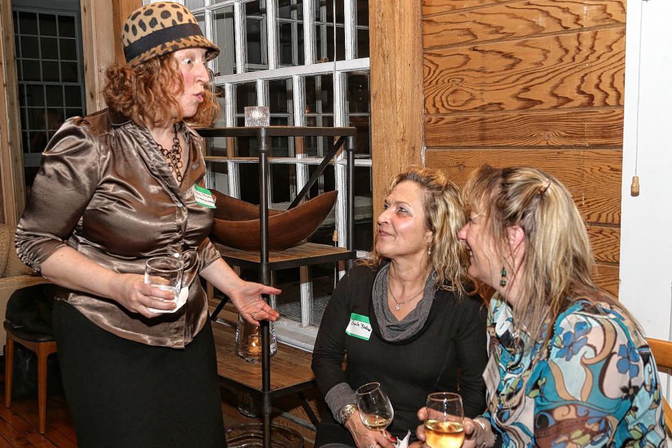 Julie Johnston, left, Brenda Blakeman and Sue Bryan chat during the Chamber-to-Chamber mixer on Feb. 10 at Simon Pearce in Quechee, hosted by the Woodstock Area Chamber of Commerce and the Hartford Area Chamber of Commerce. (Gloria Towne photograph/allaroundtowne.com) - Gloria Towne |