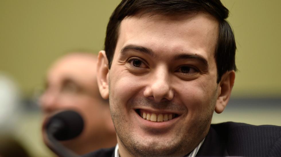 FILE - In this Feb. 4, 2016 file photo, Pharmaceutical chief Martin Shkreli smiles on Capitol Hill in Washington during the House Committee on Oversight and Reform Committee hearing on his former company's decision to raise the price of a lifesaving medicine.  Shkreli briefly united Democrats and Republicans on Capitol Hill this week, as lawmakers took turns blasting the price-hiking former CEO who has become the new poster child for corporate greed. (AP Photo/Susan Walsh) - Susan Walsh | AP