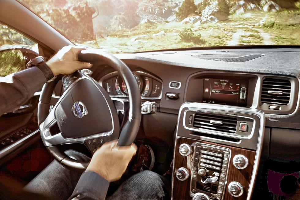 The V60 Cross Country interior is ready for an overhaul. It uses an old-school screen mounted high in the dash, controlled by knobs and buttons below, for navigation, climate and audio. (Photo courtesy Volvo/TNS) - Volvo | Chicago Tribune