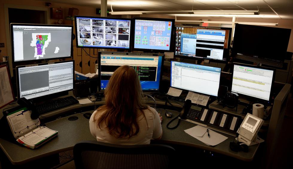 Dispatcher Martha Morse works during her shift at Hartford dispatch in Hartford, Vt., on March, 4, 2016.  (Valley News - Jennifer Hauck) Copyright © Valley News. May not be reprinted or used online without permission. Send requests to permission@vnews.com. - Jennifer Hauck | Valley News