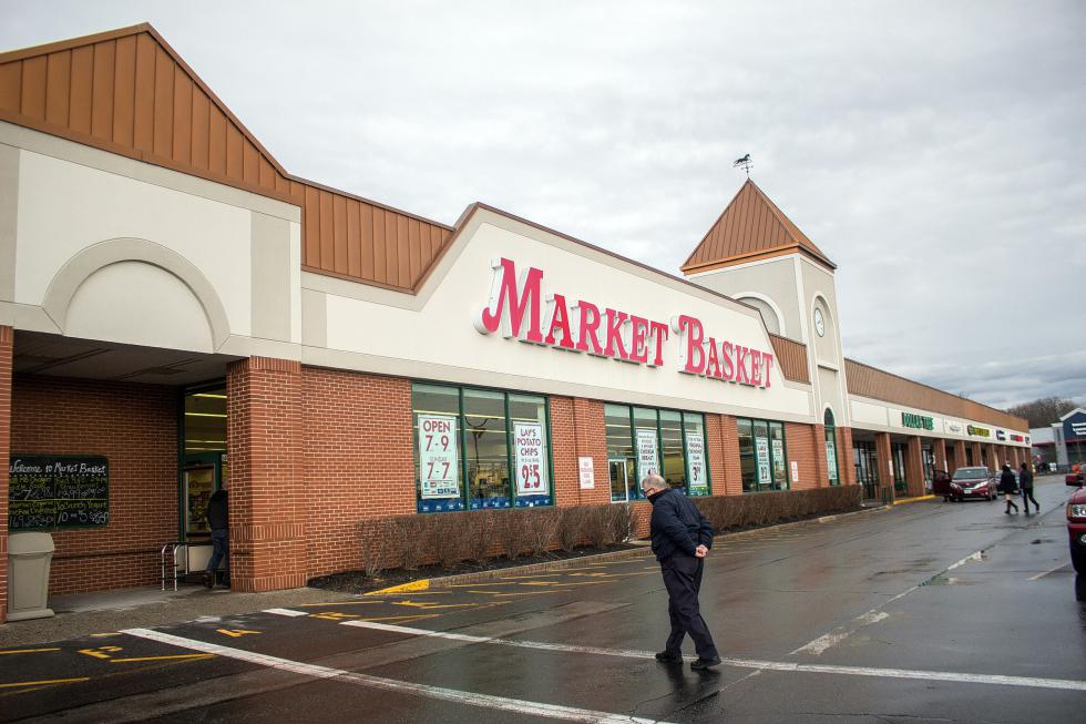 Fred Pilch, 88, of Concord walks into Market Basket Monday. Pilch said he's "unsentimental" about the fact that he's been a Market Basket customer for decades due to the low prices there.   (ELODIE REED/ Monitor staff) - ELODIE REED | Concord Monitor