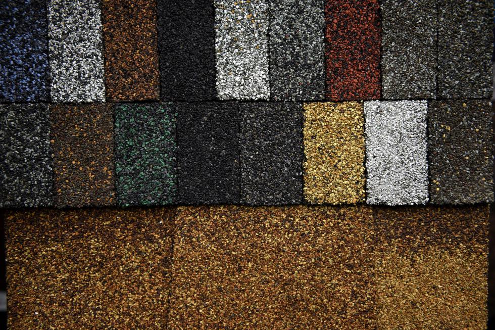 Shingle samples from HP Roofing, LLC. at the 38th annual HomeLife Expo in Hanover, N.H., on March 18, 2016. (Valley News - Jennifer Hauck) <p><i>Copyright © Valley News. May not be reprinted or used online without permission. Send requests to permission@vnews.com.</i></p> - Jennifer Hauck | Valley News