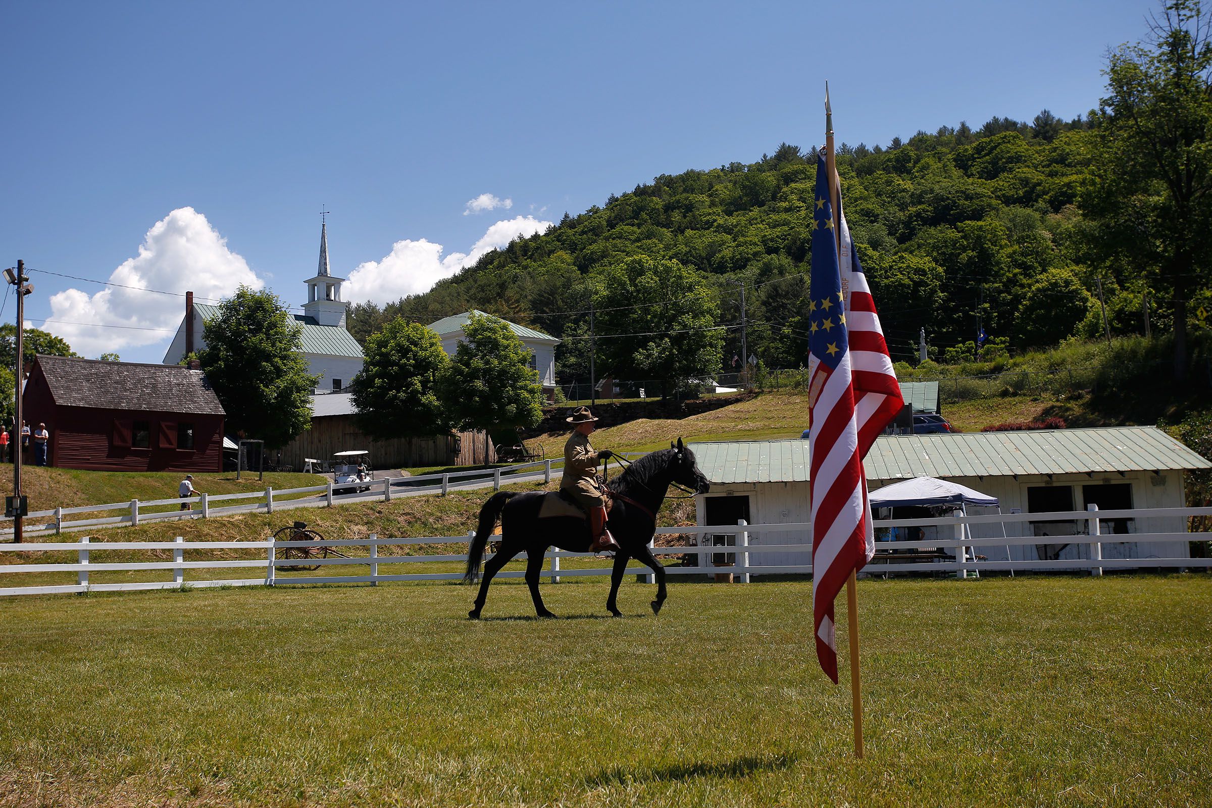 Wearing World War I-era tack and uniform, Chris Heidorf, of Gansevoort, N.Y., rides his 16-year-old Morgan stallion Coal Creek Black Oak while talking about the Morgan horse's role in warfare during Vermont History Expo 2016 in Tunbridge, Vt., on June 18, 2016. An Iraq veteran, Heidorf breeds Morgans at his farm and gives living history presentations across the East. (Valley News - Geoff Hansen) Copyright Valley News. May not be reprinted or used online without permission. Send requests to permission@vnews.com.