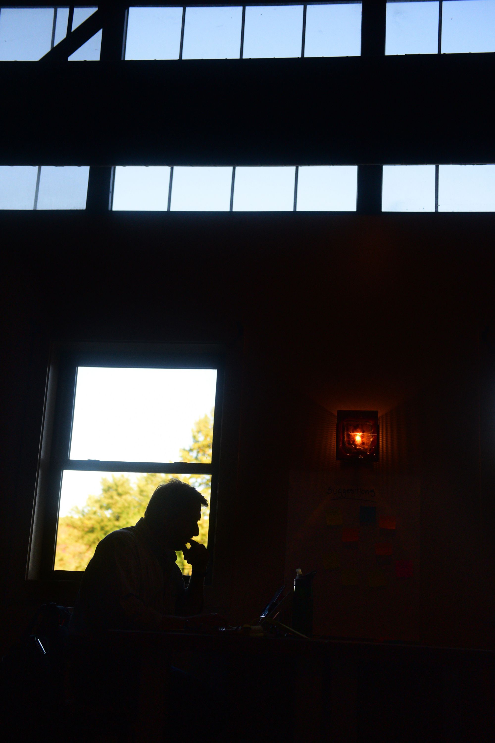 Chip Brettell, left, of Pomfret, Vt., meets with Libby Moyer, of Strafford, Vt., in the common area of The Engine Room in White River Junction, Vt., on October 7, 2016.  (Valley News- Sarah Priestap) Copyright Valley News. May not be reprinted or used online without permission. Send requests to permission@vnews.com.
