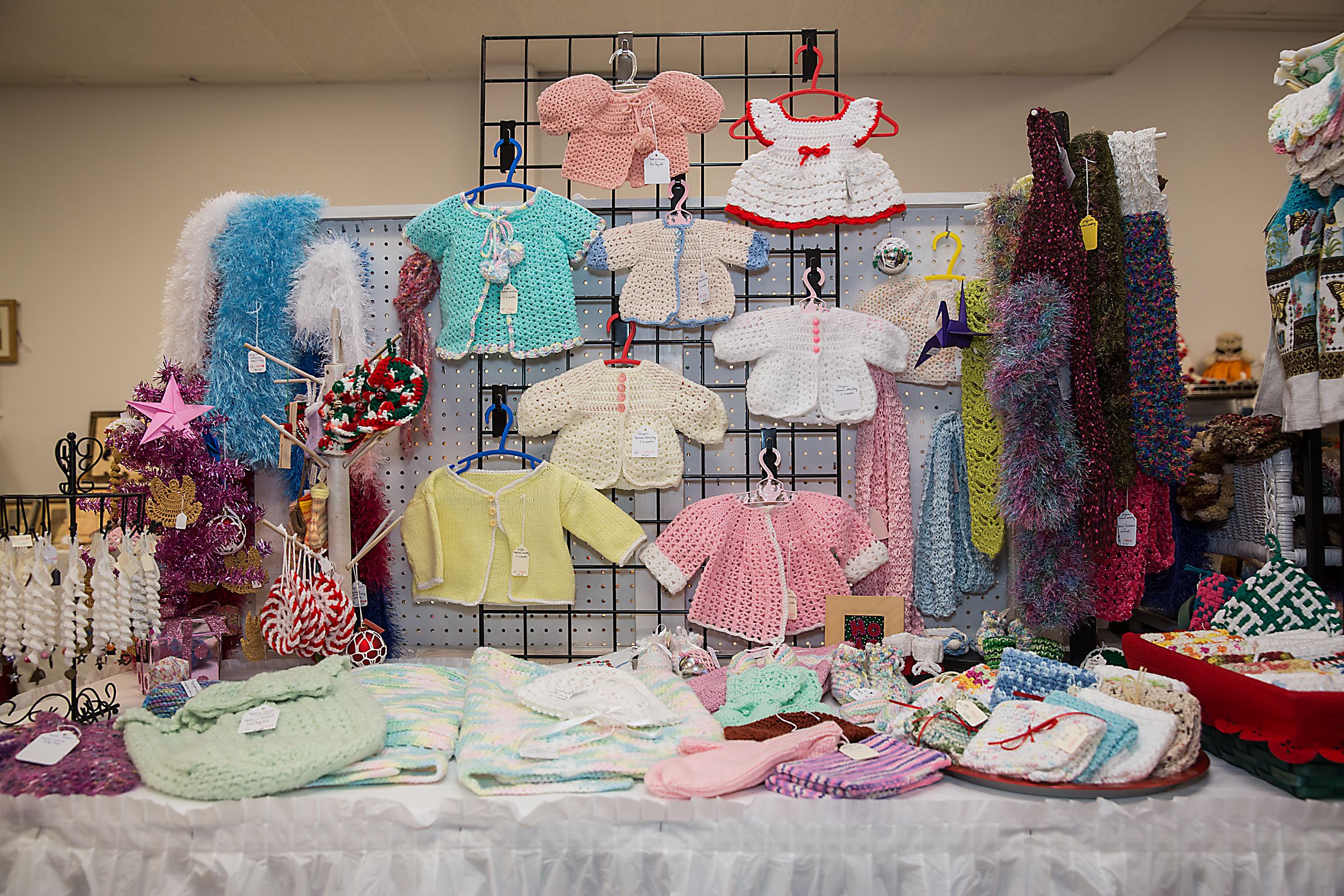 Products on display at the annual Lebanon Arts and Crafts Association Christmas sale at the Upper Valley Plaza in West Lebanon, N.H. (Valley News - John Happel) Copyright Valley News. May not be reprinted or used online without permission. Send requests to permission@vnews.com.