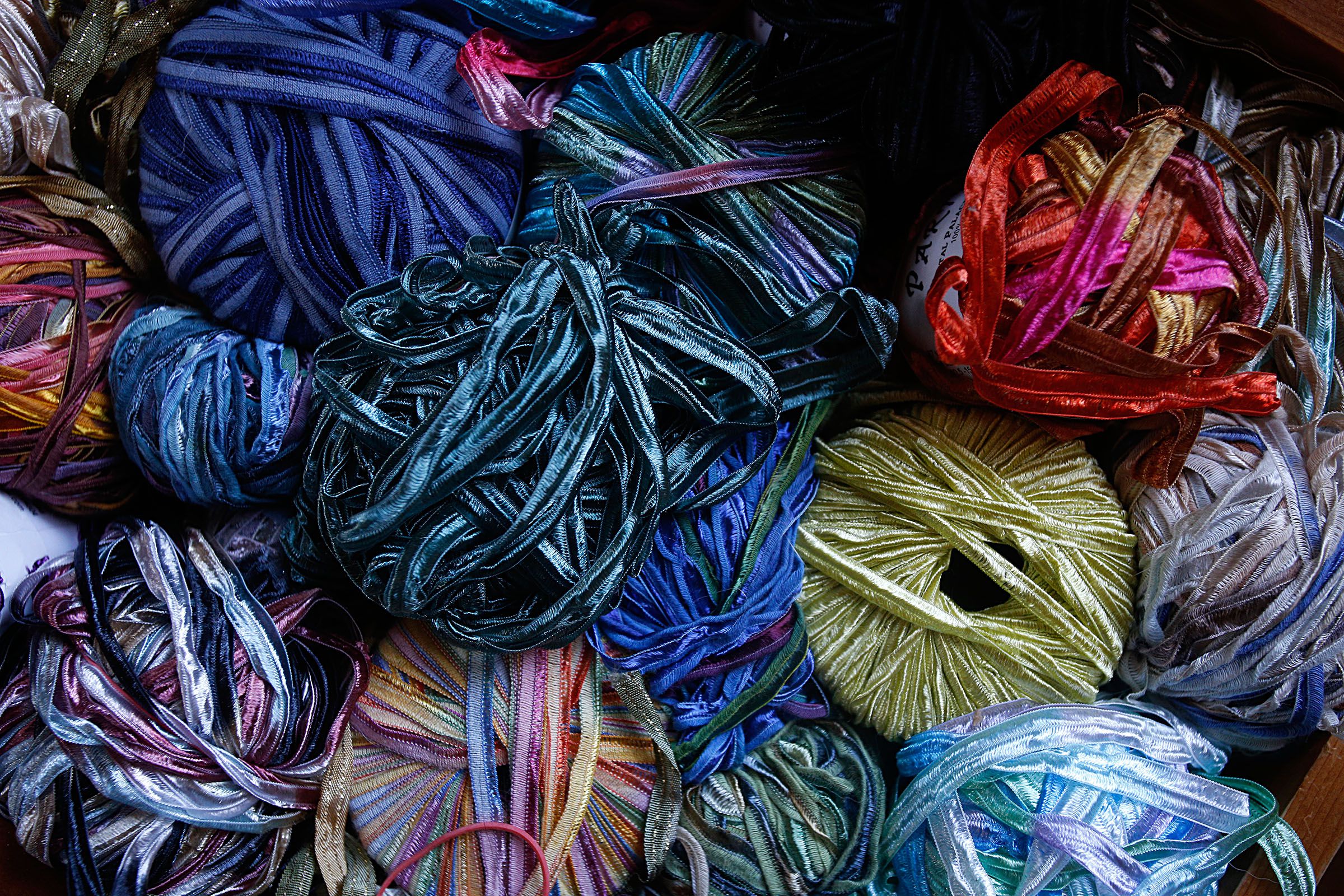 Carrie Cahill Mulligan's collection of nylon, rayon and silk yarn used for decorative embroidery at her home studio in Canaan, N.H., on November 18, 2016, for the handknit hats she sells. (Valley News - Geoff Hansen) Copyright Valley News. May not be reprinted or used online without permission. Send requests to permission@vnews.com.