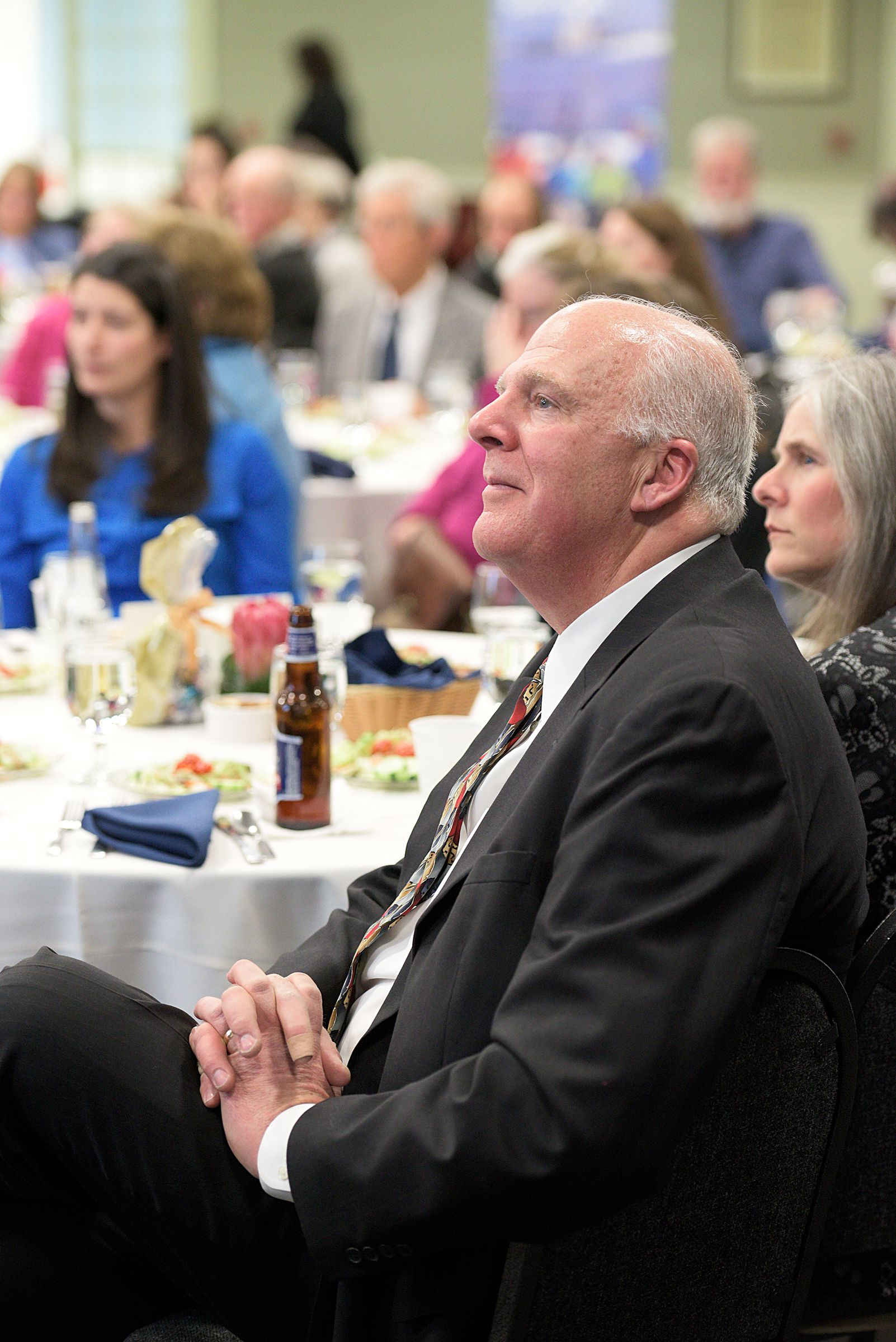 Rich Marshall, of New London, listens to the annual report of Lake Sunapee Region Chamber of Commerce Dan O'Halloran during the Chamber's annual meeting at Colby-Sawyer College in New London, N.H., Tuesday, January 17, 2017. After two years as vice president, Marshall took over the presidency from O'Halloran Wednesday night. (Valley News - James M. Patterson) Copyright Valley News. May not be reprinted or used online without permission. Send requests to permission@vnews.com.