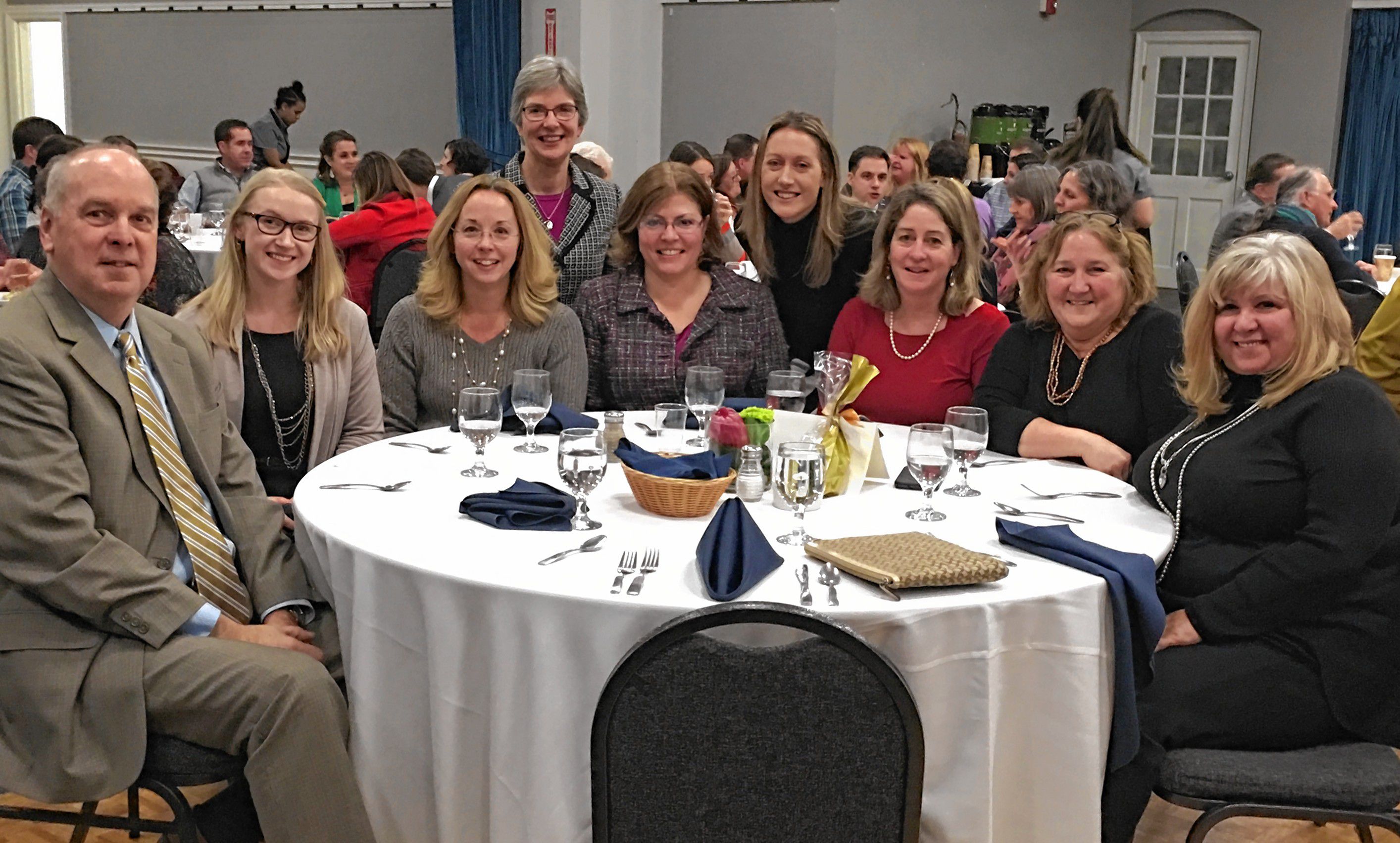Lake Sunapee Bank was named Business of the Year at the Lake Sunapee Region Chamber of Commerce’s recent annual meeting. Pictured, from left, are Bill McIver, Kaitlyn Covel, Cathy Murray, Deb Johnson, Marie Pelletier, Meghan Wilkie, Jayne Rayno, Roxanne Shedd and Tammy Heiser. (Courtesy photograph)