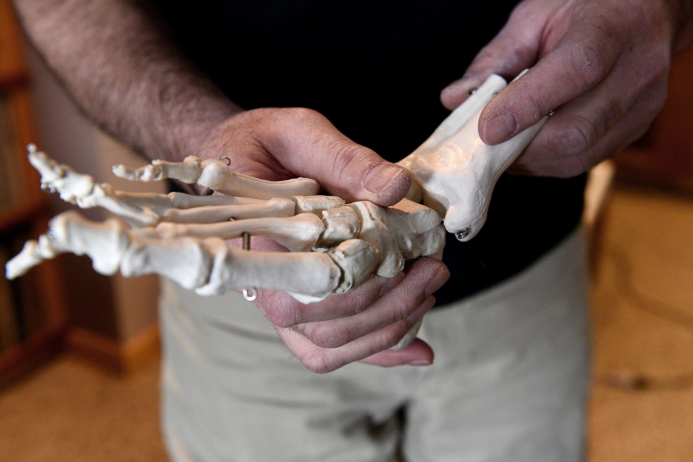 ( NO BONES ABOUT IT Pedorthist David Strousse uses a model to show how joints work in a foot.