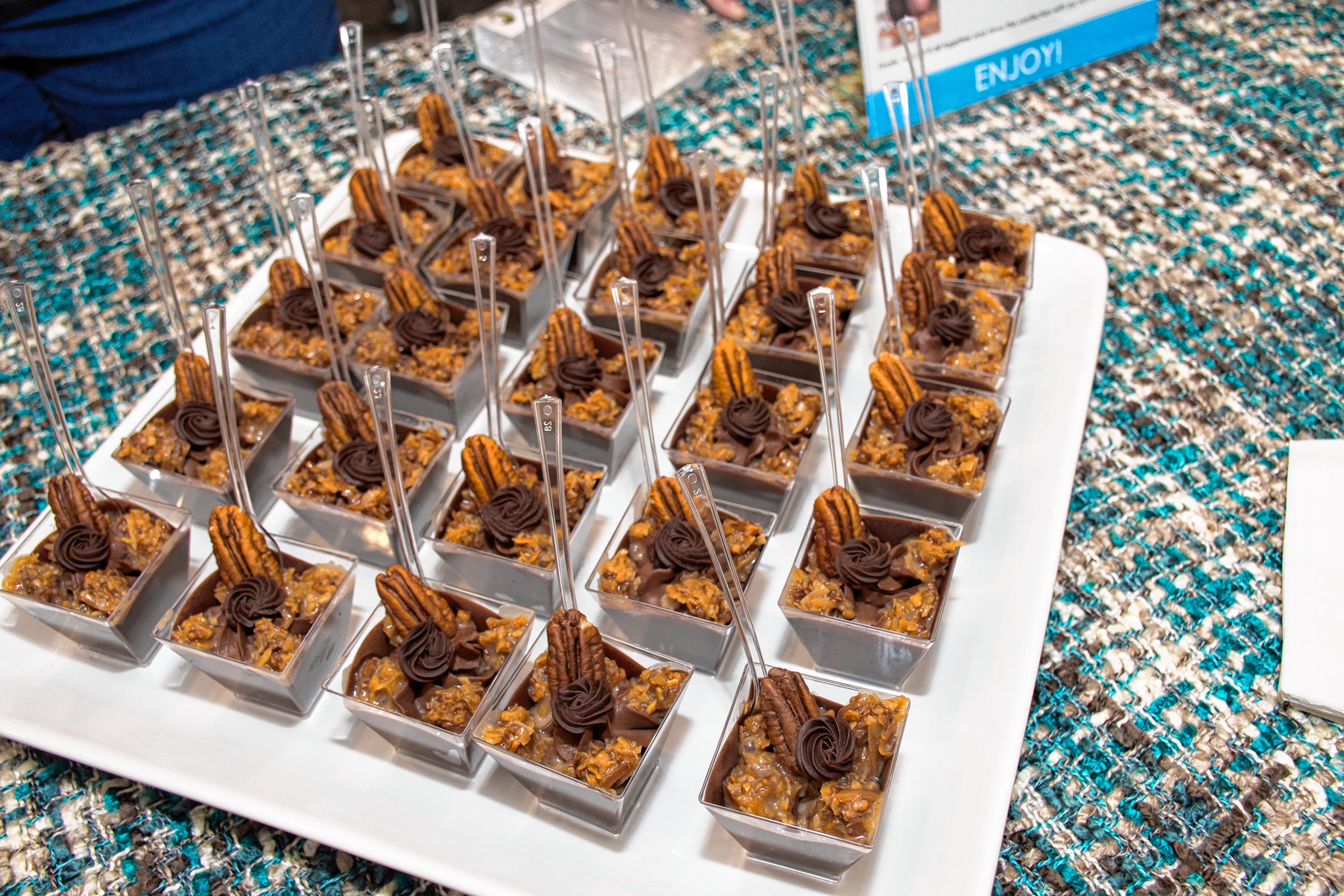 A plate of Pleasent Lake Cheesecake Company German Chocolate Cheesecake samples. Nancy Nutile-McMenemy photograph
