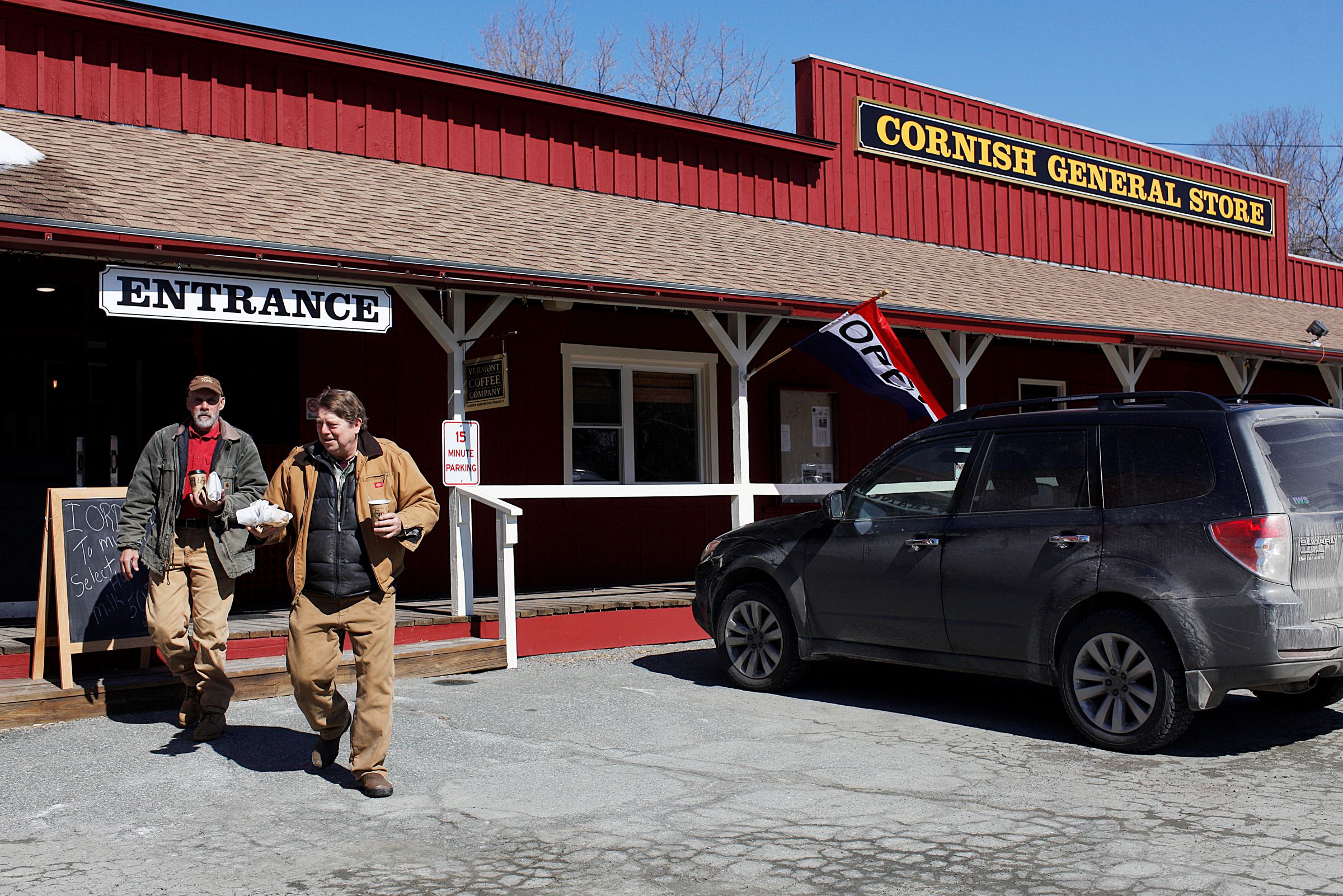 : OPEN FOR BUSINESSAfter buying lunch, electricians Rob Richardson, left, of Gilmanton, N.H., and Andy Sanborn, of Sanbornton, N.H., leave the newly reopened Cornish General Store.