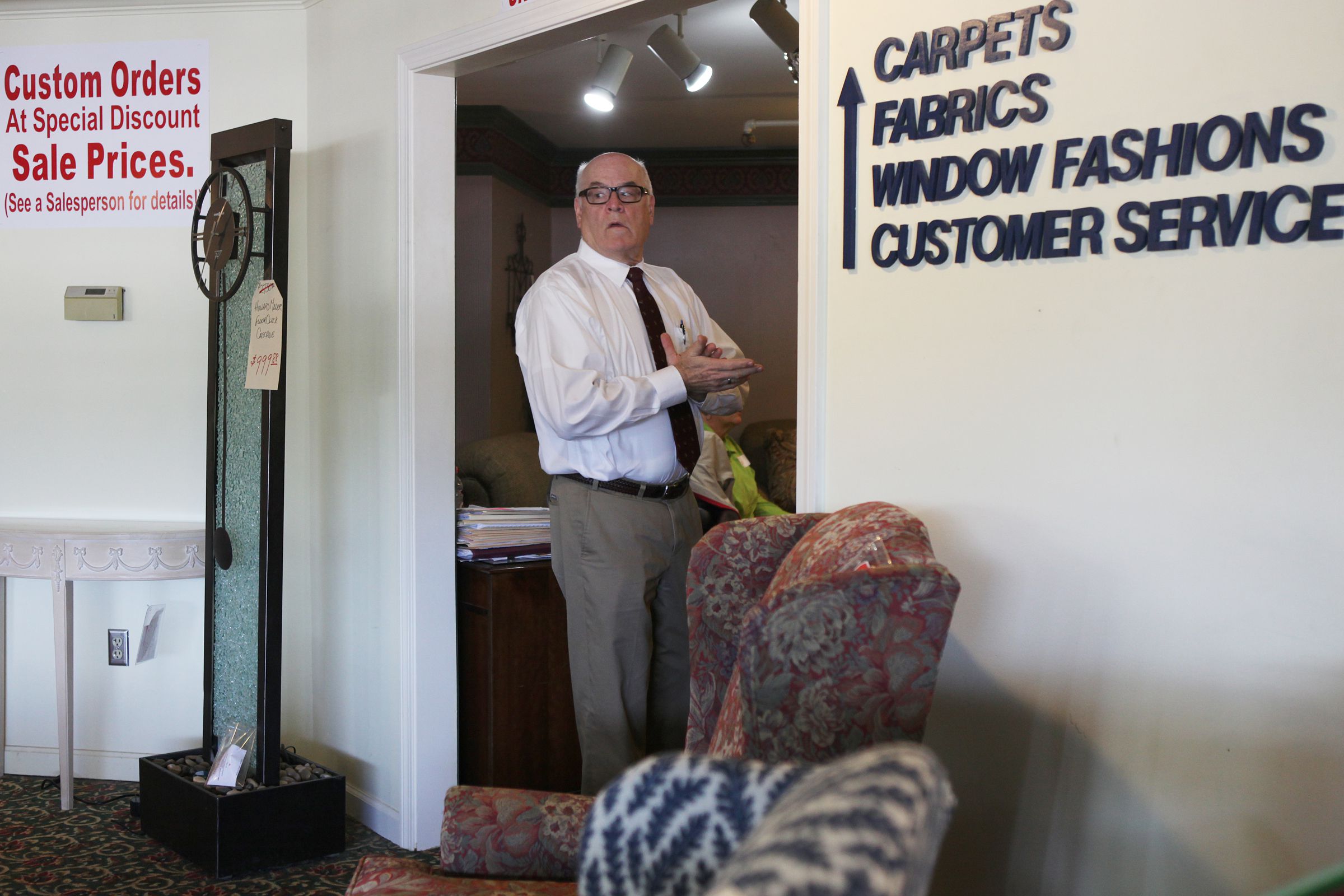 Dan Rutledge checks the main showroom at Bridgman's Furniture on Friday, May 12, 2017, in Lebanon, N.H. Bridgman's Furniture owner Steve Rutledge is retiring and selling his stake to his brother Dan, who will take over day-to-day operations. (Valley News - Jovelle Tamayo) Copyright Valley News. May not be reprinted or used online without permission. Send requests to permission@vnews.com.