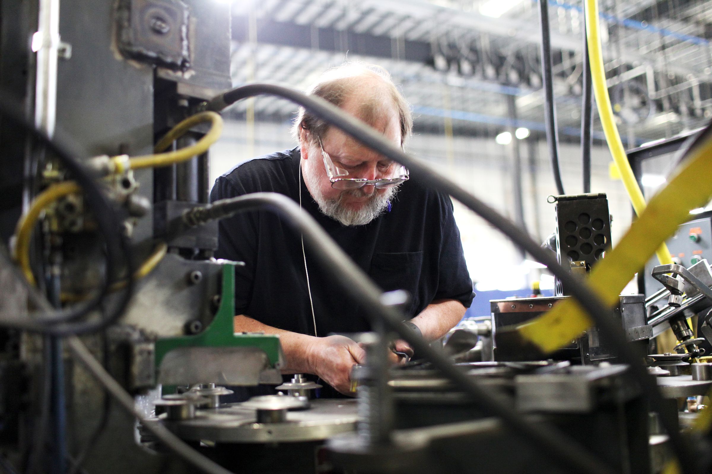 Machinist Joel Tremblay, of Lebanon, N.H., processes pulley parts at New Hampshire Industries, also known as NHI, on Tuesday, June 6, 2017, in Claremont, N.H. NHI, a pulley manufacturer, recently consolidated its operations from Lebanon and Wisconsin to a 137,000-square-foot building in Claremont. (Valley News - Jovelle Tamayo) Copyright Valley News. May not be reprinted or used online without permission. Send requests to permission@vnews.com.
