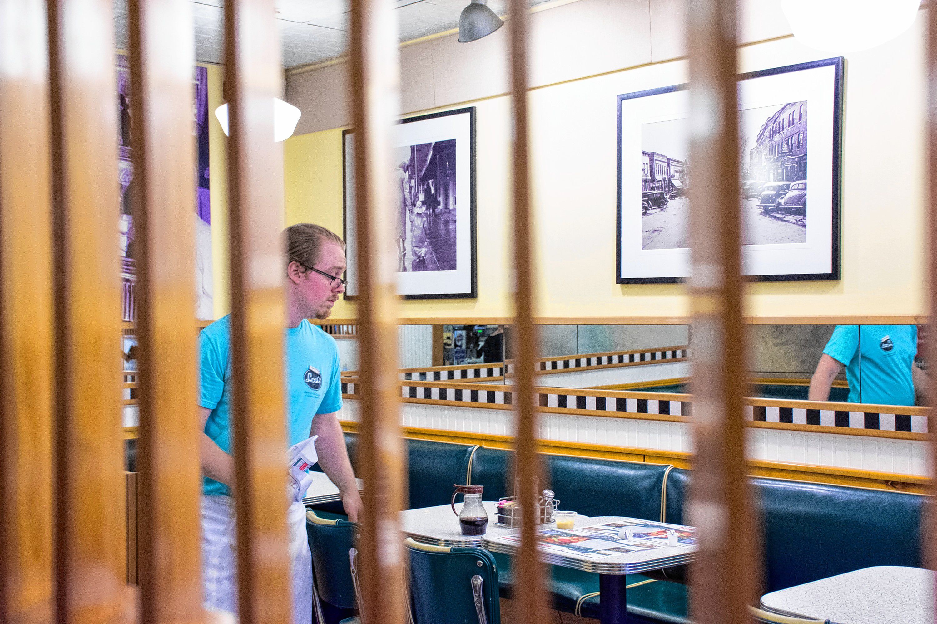 Kevin McGreal from Wilder, Vt picks up after his last customer. Nancy Nutile-McMenemy photograph.