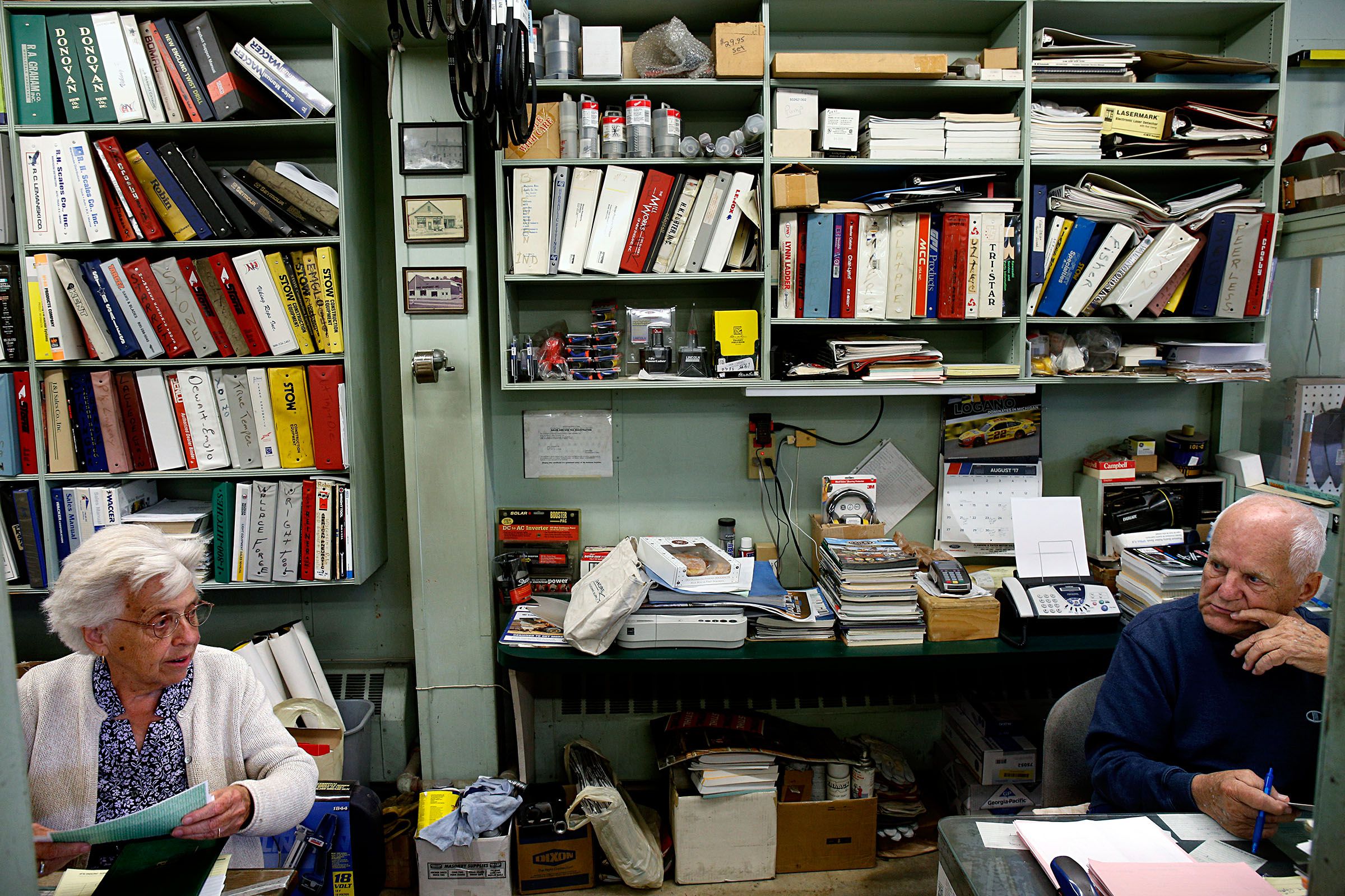 Phyllis and Bill Shambo Sr. talk in the office at Kibby Equipment in White River Junction, Vt., on Aug. 31, 2017. Phyllis, 80, and Bill, 85, have owned the business for 60 years, the same amount of time they have been married. The business will be closing at the end of September. (Valley News - Geoff Hansen) Copyright Valley News. May not be reprinted or used online without permission. Send requests to permission@vnews.com.