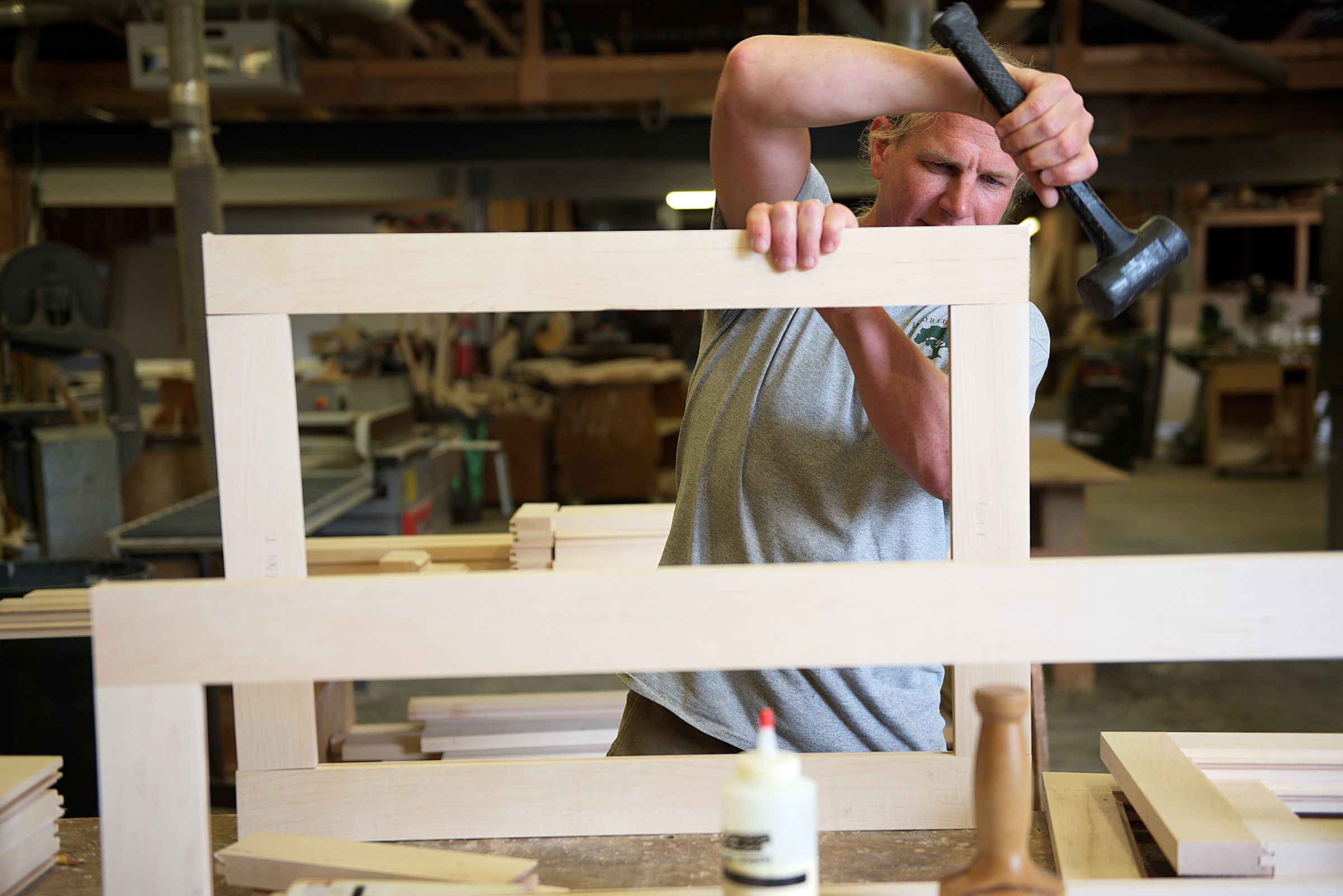 Cabinet maker Andy Mulligan fits together the frame of a cabinet door for a residential customer in the carpentry shop of Trumbull-Nelson Construction Company in Hanover, N.H., where he has worked a total of ten years, Thursday, September 15, 2017. Trumbull-Nelson is celebrating 100 years since its founding in 1917. (Valley News - James M. Patterson) Copyright Valley News. May not be reprinted or used online without permission. Send requests to permission@vnews.com.